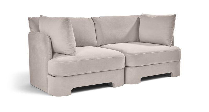 Light gray velvet upholstered 2-piece loveseat with two seat sections and bolster pillows