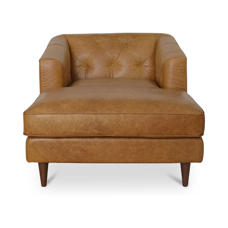 Tan-brown tufted leather accent chair with boxy arms and tapered wooden legs