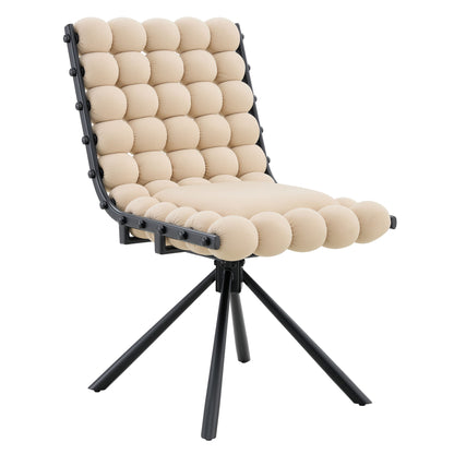 Beige puffy bubble dining chair, black frame with studded ball-chain accents