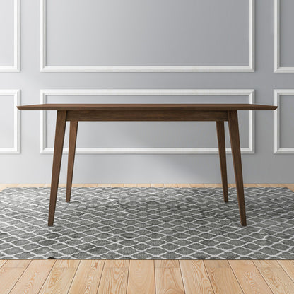 Dark brown rectangular dining table with slim tapered legs