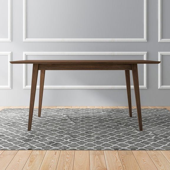 Dark brown rectangular dining table with four slim legs and flat top.