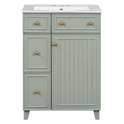 Green bathroom vanity cabinet with ceramic sink, two drawers and one paneled door