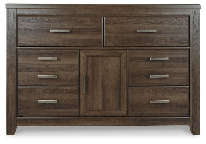 Dark brown wood dresser with center door and six drawers, silver bar handles.