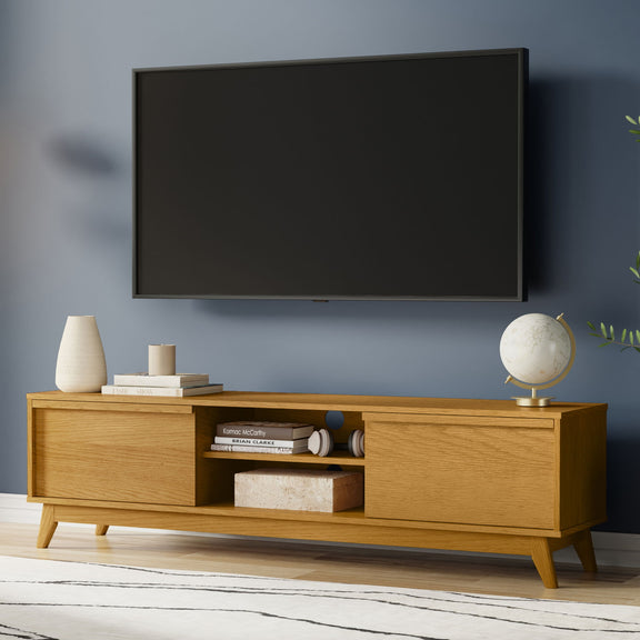 Light brown low media console with two drawers, side cabinet doors, and center open shelf.