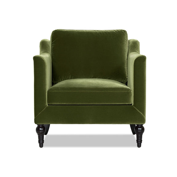 Green upholstered accent chair with square arms, cushioned seat and dark turned legs