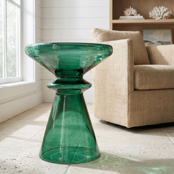 Green hourglass-shaped blown glass accent table with glossy finish.