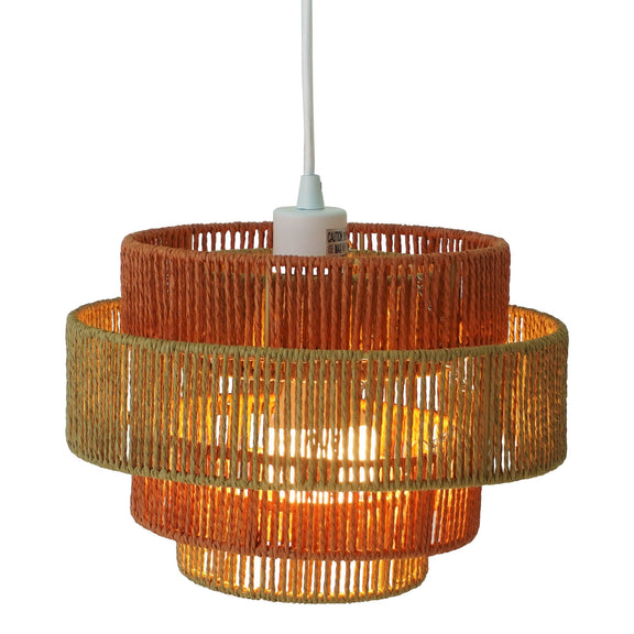 Orange woven pendant lamp close-up, round cage shade with light through vertical slats
