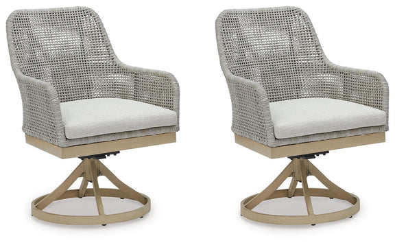 Pair of gray woven swivel chairs with white cushions and round bases