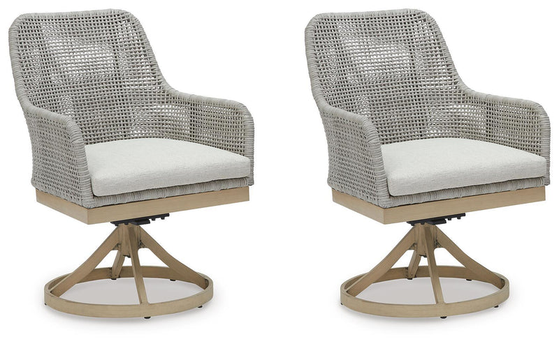 Pair of gray woven swivel chairs with white cushions and round bases