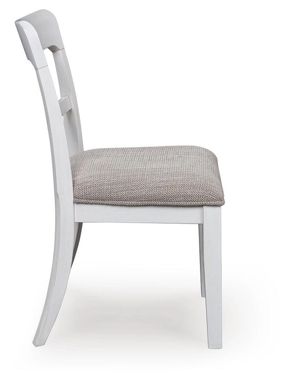 White upholstered dining side chair with light gray fabric seat and curved back