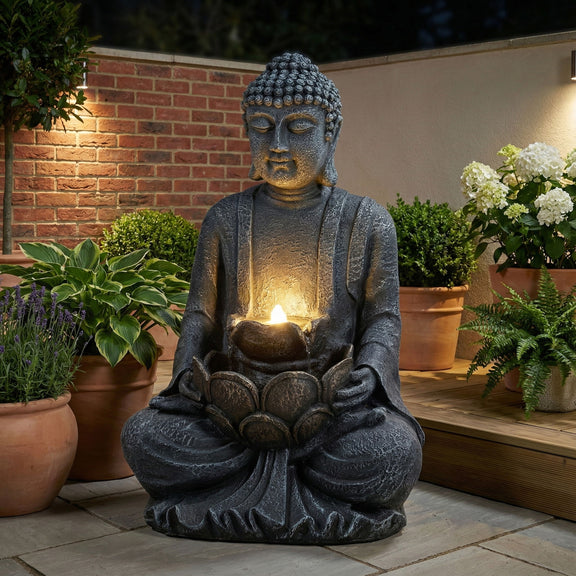 Gray seated Buddha water fountain statue with glowing bowl and LED light