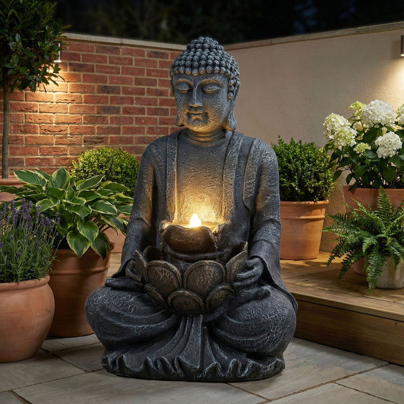Gray seated Buddha water fountain statue with glowing bowl and LED light