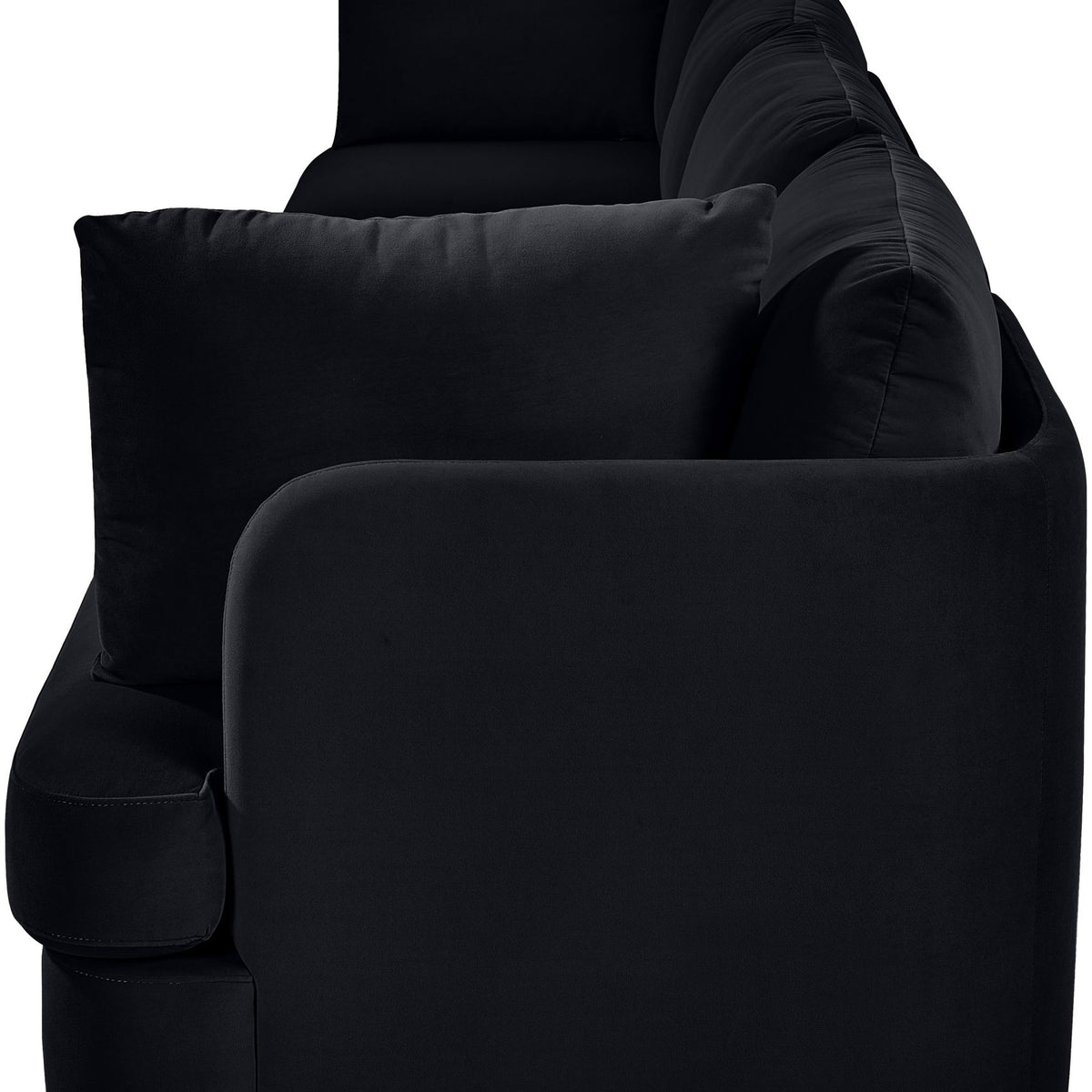 Black velvet performance fabric modular sofa with rounded arms and seat cushions