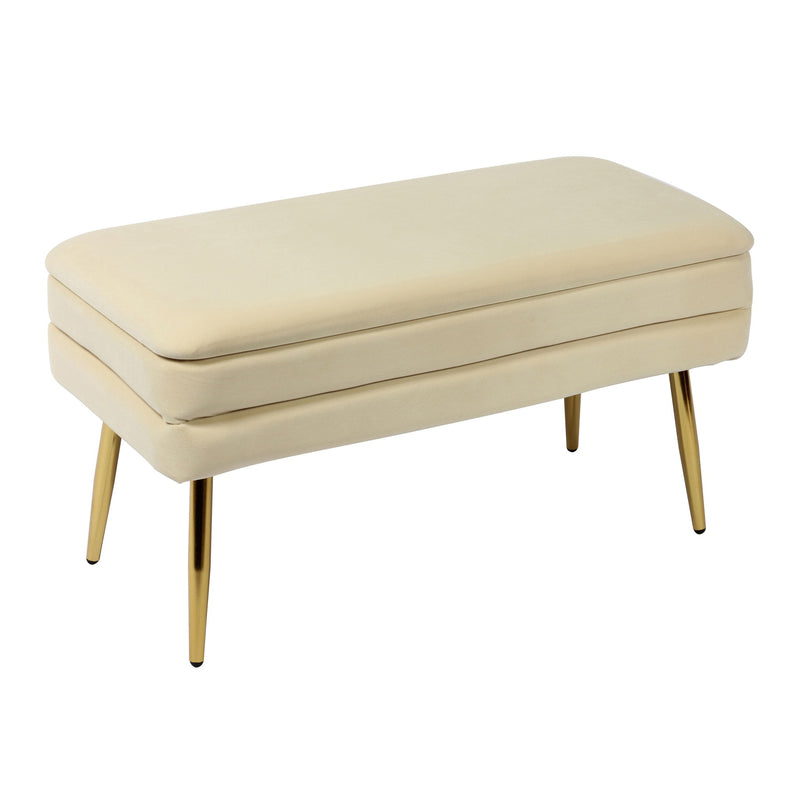Ziva velvet storage bench in beige, padded lid and tapered gold legs.