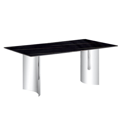 Black marble-look glass dining table with chrome pedestal legs