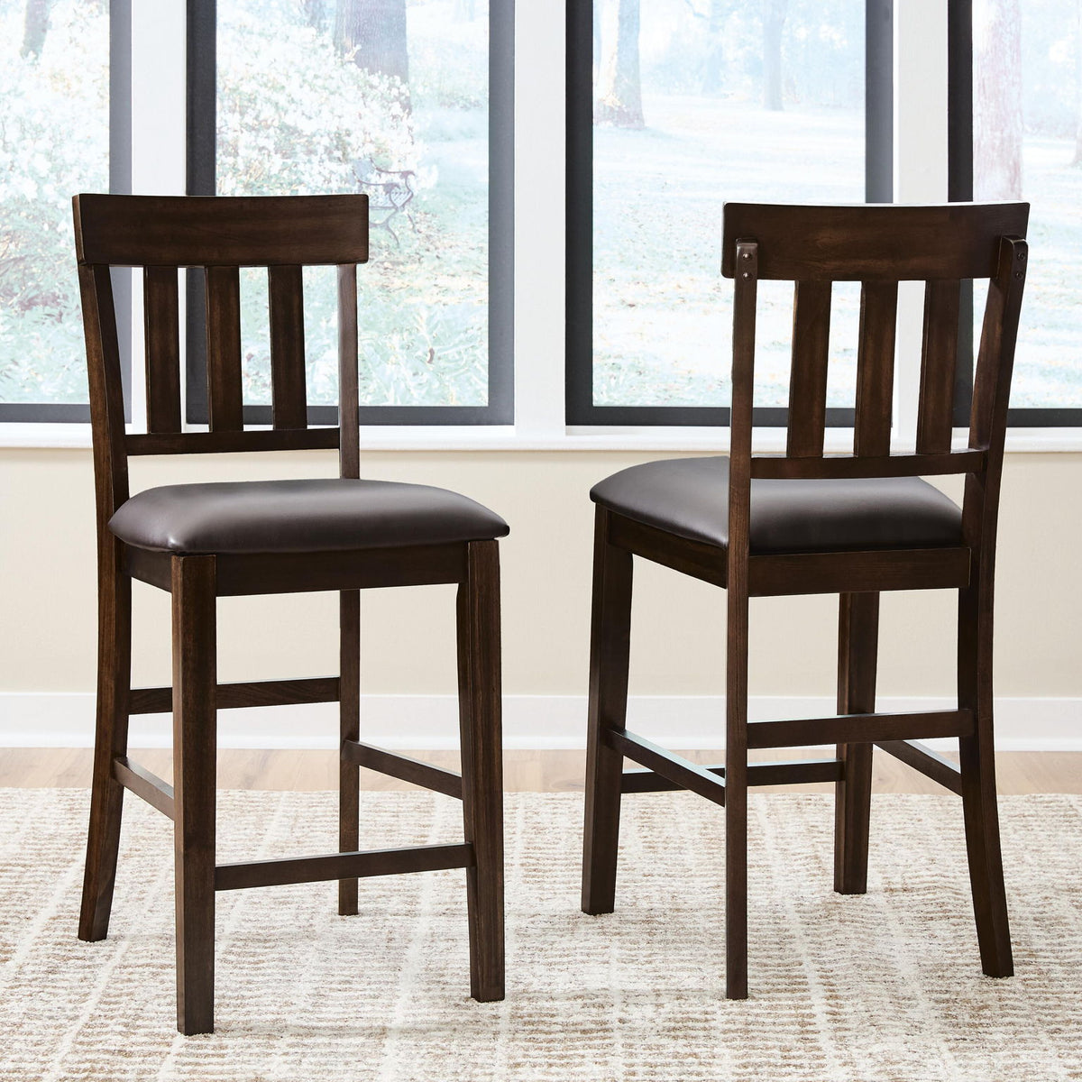 Upholstered barstool set of 2 with dark brown wood legs and dark padded seats