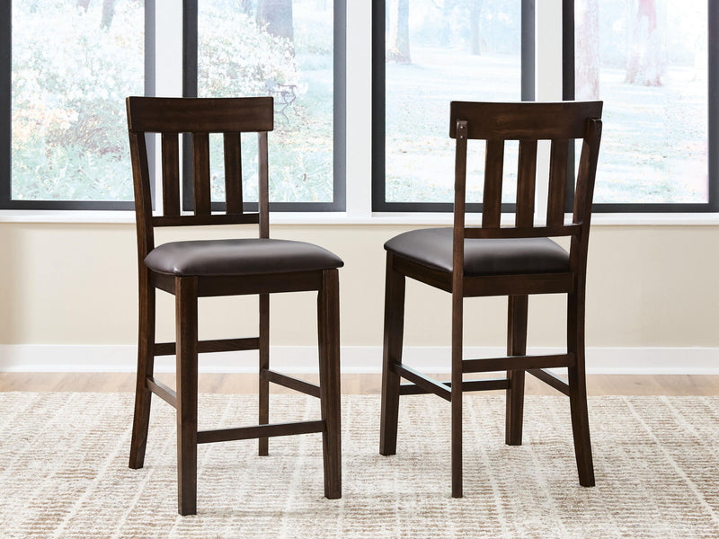 Upholstered barstool set of 2 with dark brown wood legs and dark padded seats