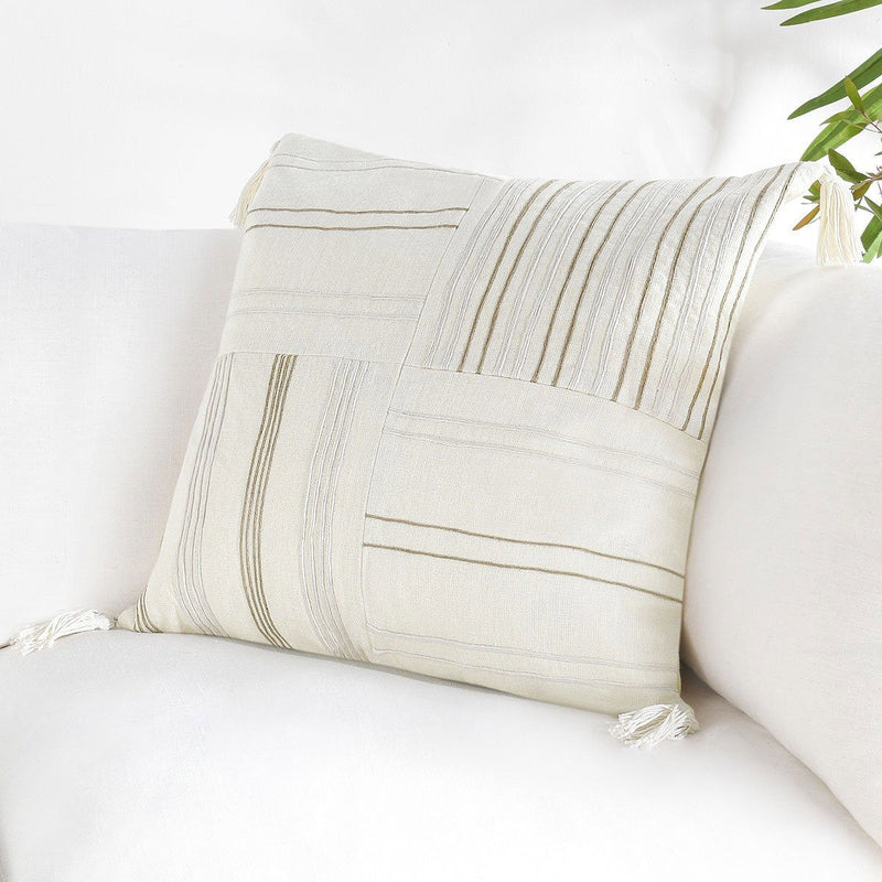 Ivory natural lumbar pillow with stitched stripe panels and corner tassels