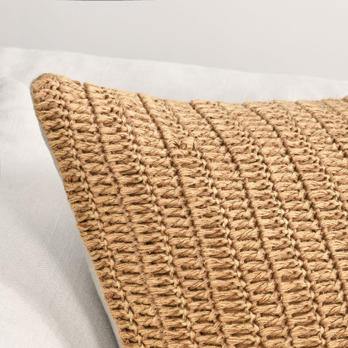 Honey woven fabric pillow cover close-up, braided knit texture