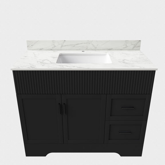 Black bathroom vanity cabinet with fluted doors, drawers, and built-in sink
