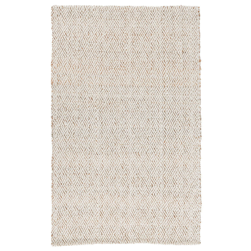 Tomar natural rug showing an allover diamond motif with short fringes along the sides