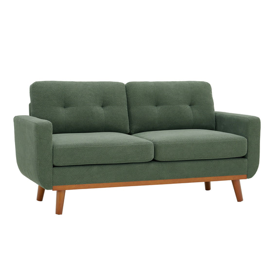 Two-seat sofa in muted green fabric with tufted back cushions and wooden legs
