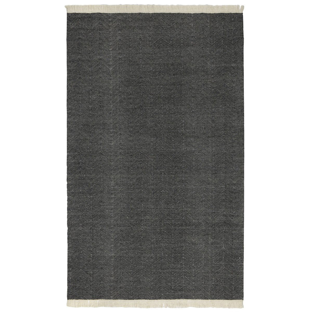 Charcoal indoor/outdoor rug with subtle texture and cream fringe