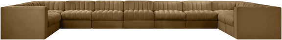Tan modular sectional sofa with velvet-look upholstery and tufted cushions