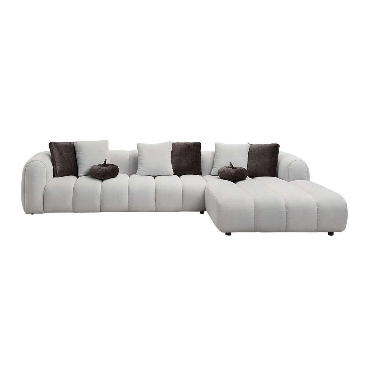 Ivory white sectional sofa with chaise and dark accent pillows