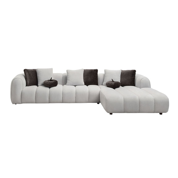 Ivory white sectional sofa with chaise and dark accent pillows