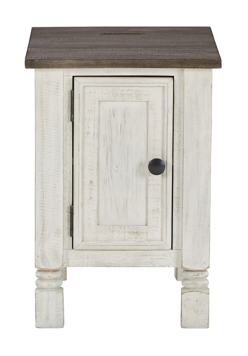 Chair side end table with dark top, white distressed door with round black knob