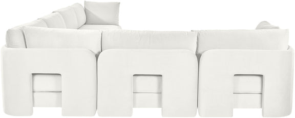 White velvet corner sectional sofa with three seat backs and cushioned arms
