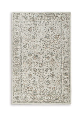 Beige rug featuring faded allover floral motifs and detailed border