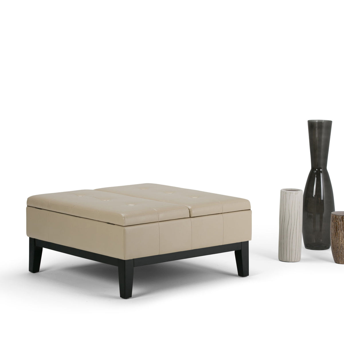 Beige lift-top storage ottoman coffee table with smooth cushioned top and dark legs