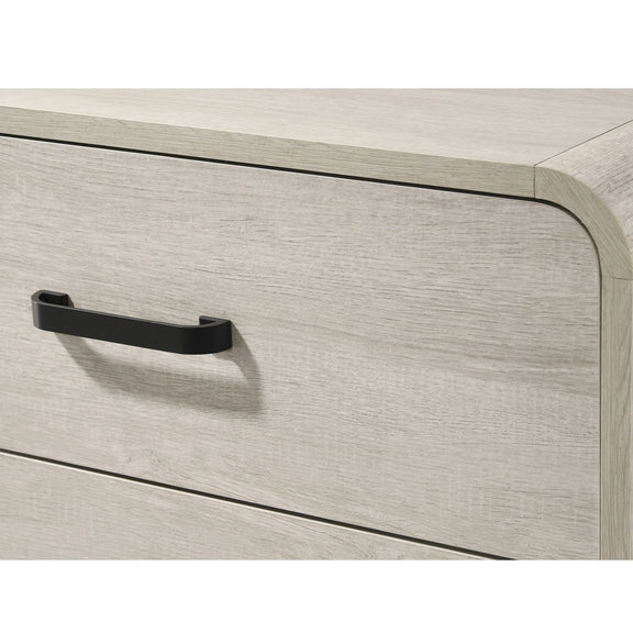 Light gray drawer chest with black bar pull on the front drawer
