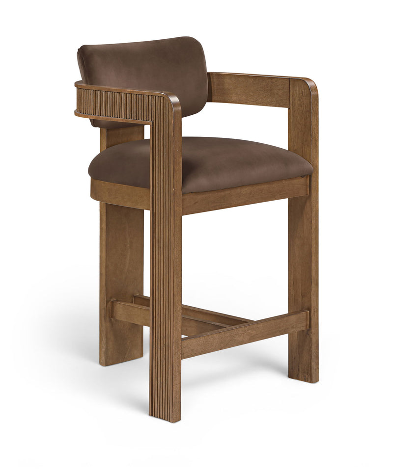 Dark brown velvet stool chair with ribbed wood sides and cushioned seat/back.