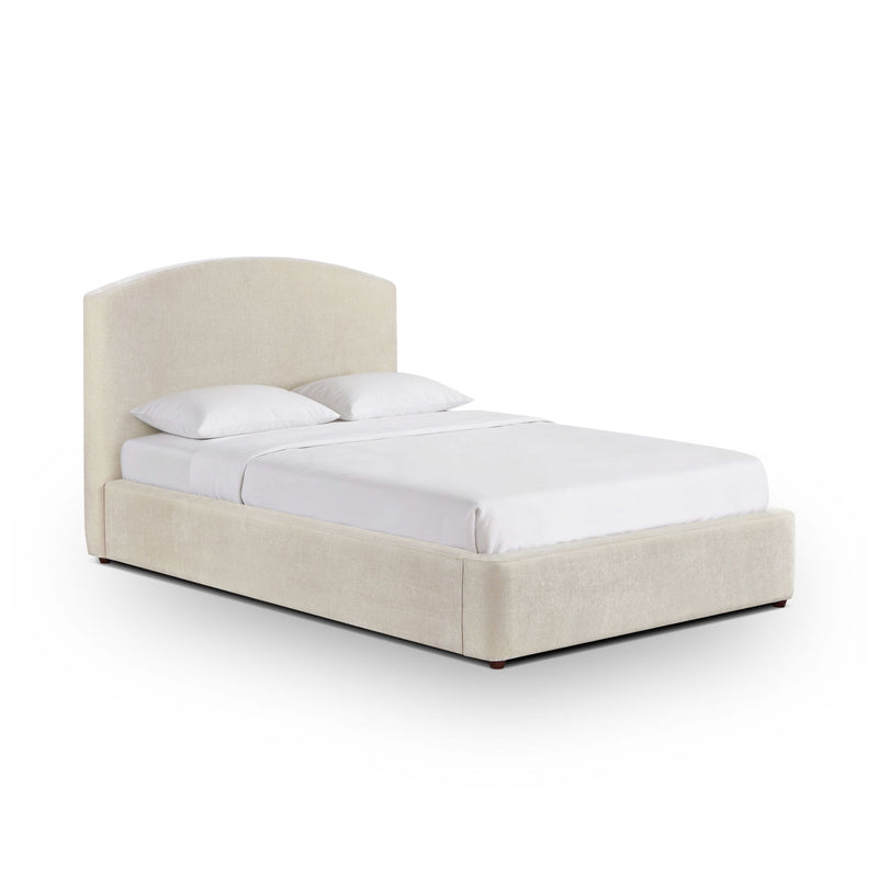 Upholstered bed with tall arched headboard, light tan frame, white bedding.