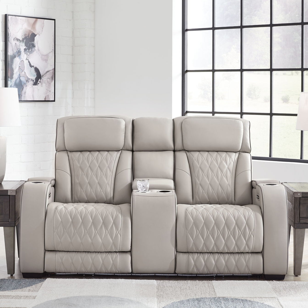 Boyington - Power Reclining Loveseat With Console/Adj Hdrst