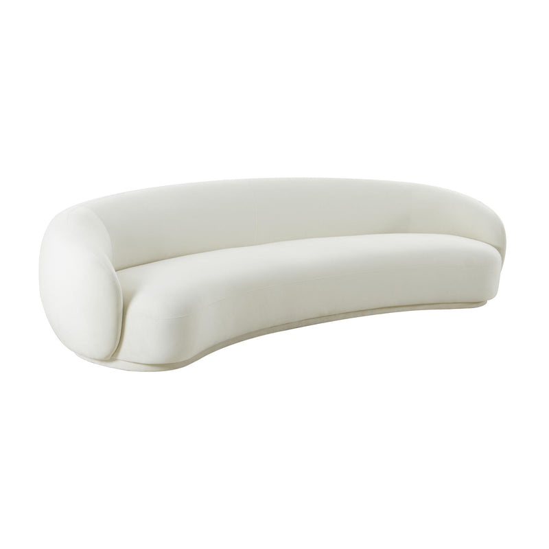 Beige velvet sofa with rounded arms and back, low modern profile