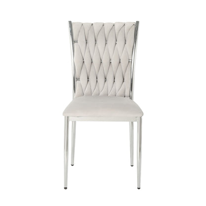 Ivory tufted dining chair with diamond-stitch back and chrome legs