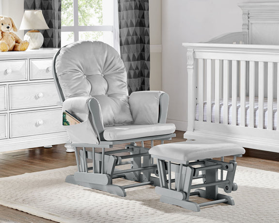 Light gray upholstered glider chair with matching ottoman, rocking base visible.