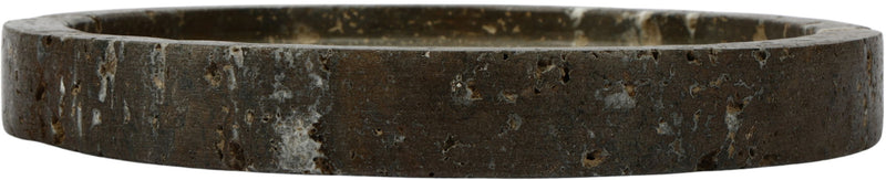 Dark gray travertine tray viewed from the side, showing a thick rim.