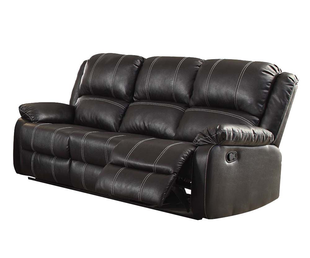 Black recliner sofa with tufted back, padded arms, and reclining seat