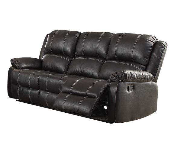 Black recliner sofa with tufted back, padded arms, and reclining seat