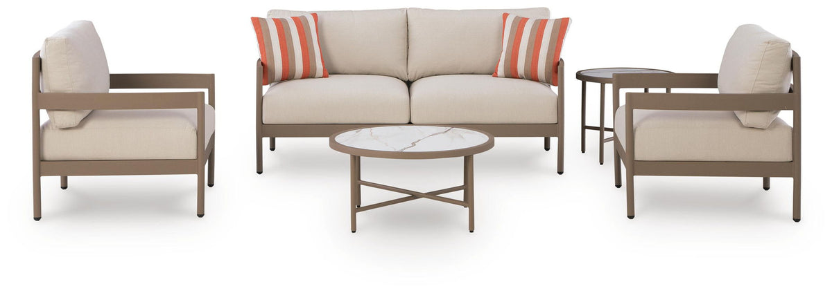Beige patio loveseat with two lounge chairs and round coffee table