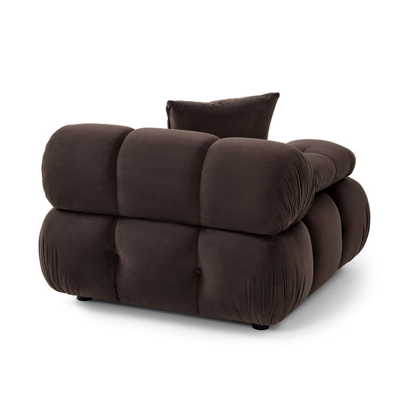 Dark brown modular corner chair side view with deep seat and plush armrests.