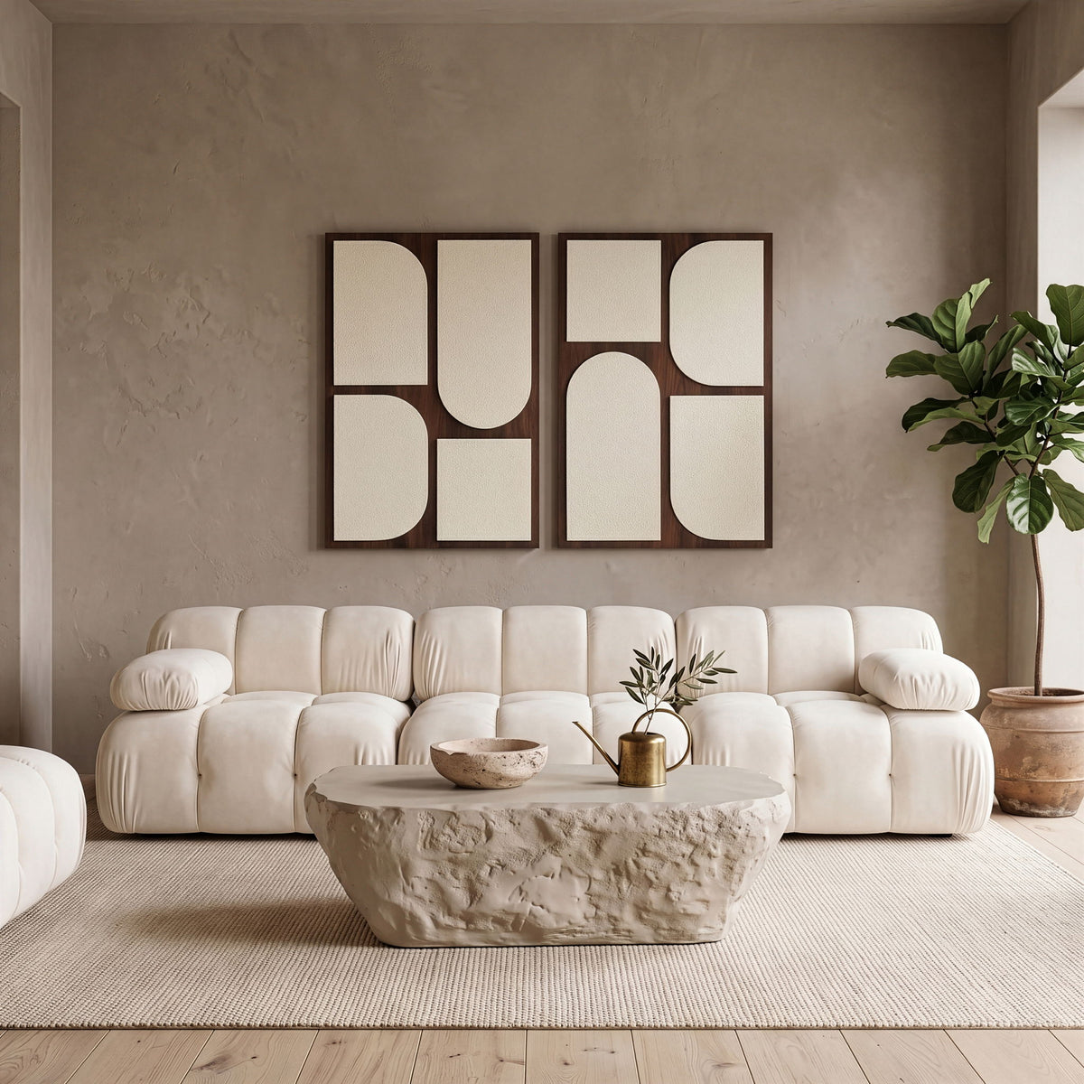 Two-piece wall art set with dark frames and beige abstract rounded panels on wall.