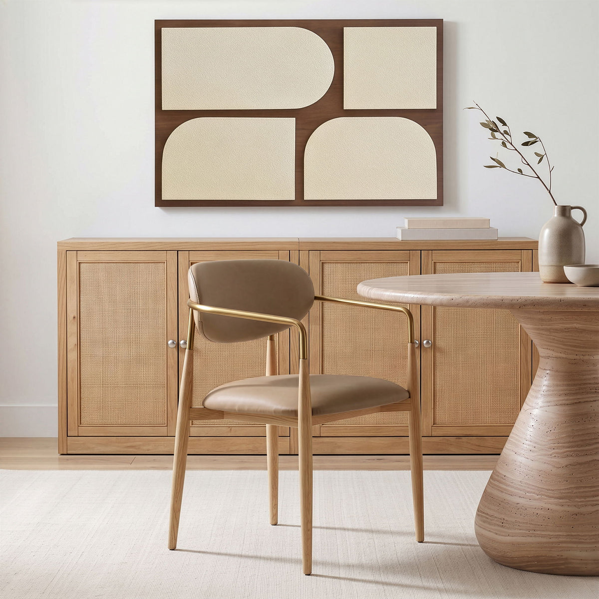 Dining arm chair with taupe upholstery seat and back, light wood legs, gold-tone frame