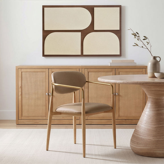 Dining arm chair with taupe upholstery seat and back, light wood legs, gold-tone frame