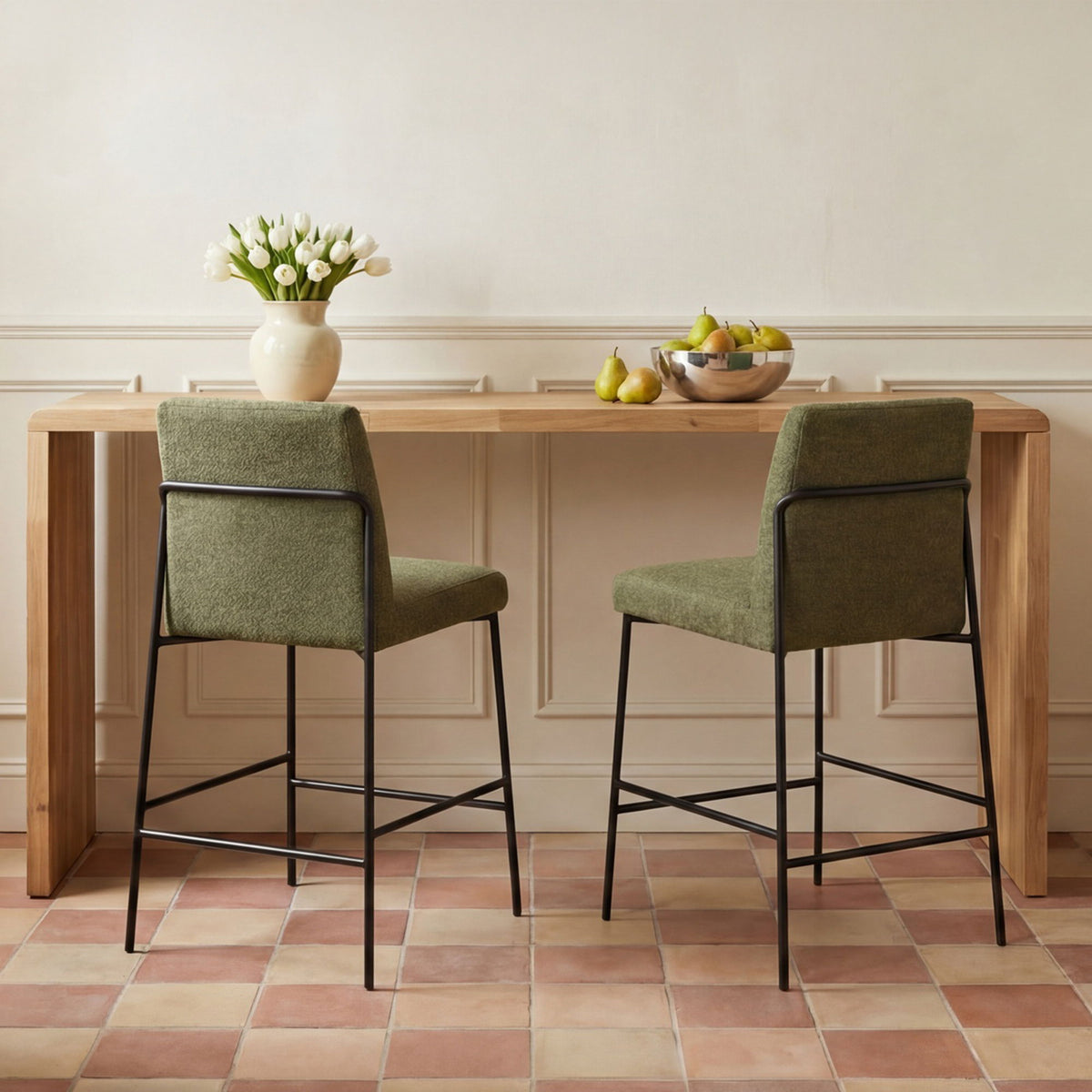 Natural wood counter table with two upholstered barstools
